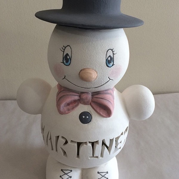 Custom carved snowman pottery with top hat